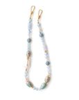 Beaded necklace with gold clasps on a white background
