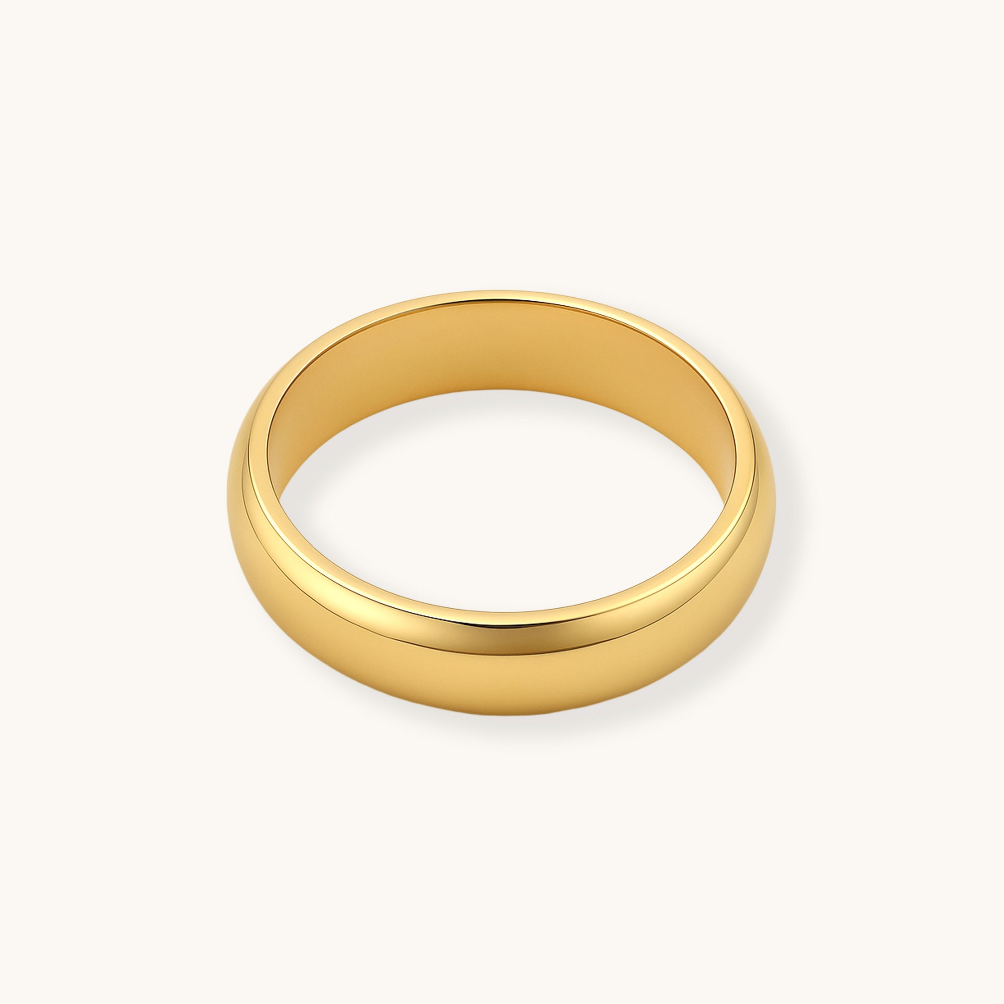 Gold ring on a white background