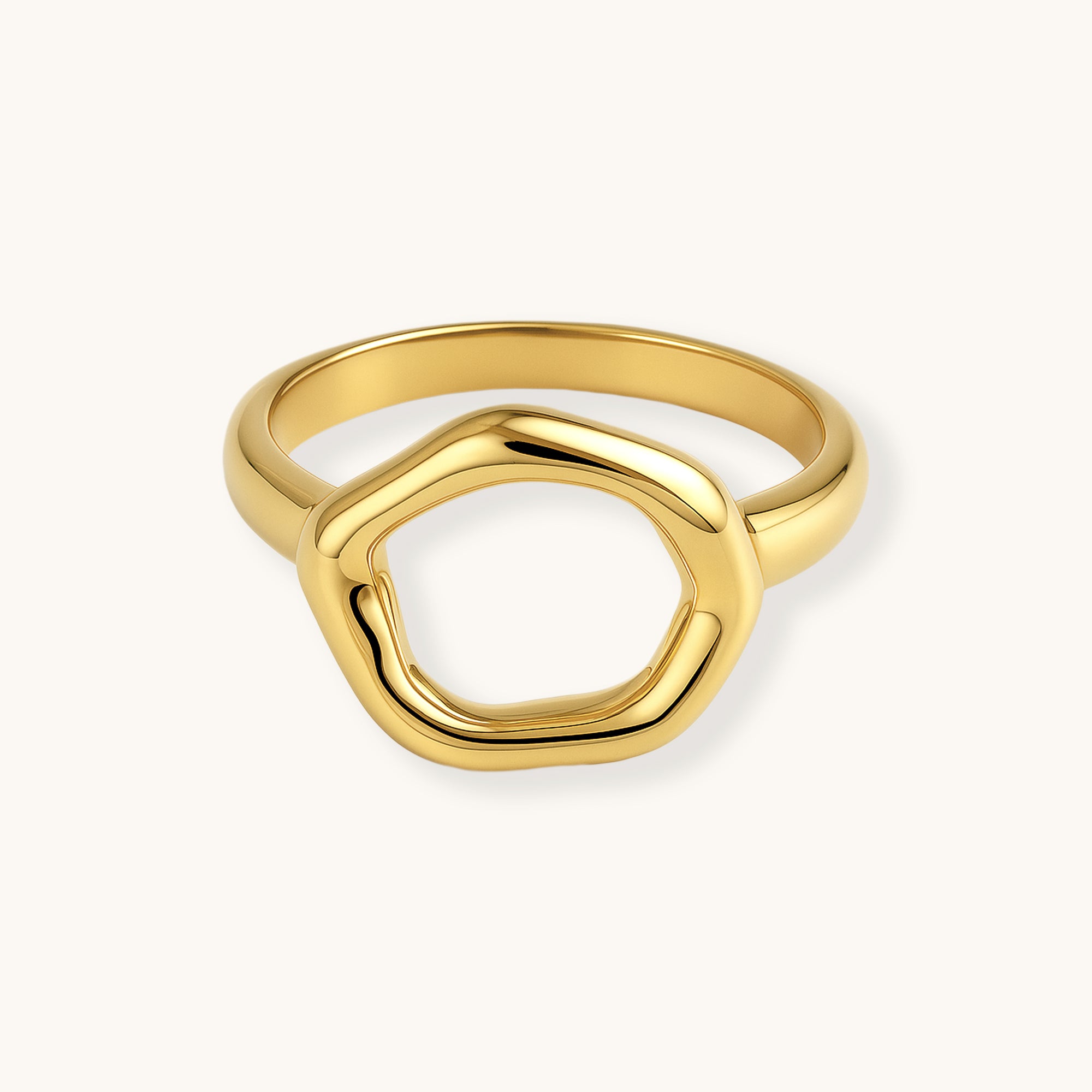 Gold ring on a white background