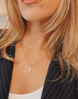 A delicate and modern 14kt gold-plated snake chain. Can be worn alone or layered.